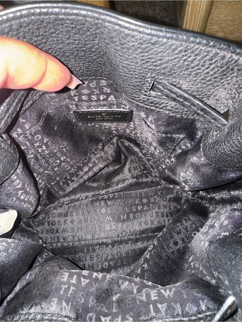 kate spade black pebbled leather tassel drawstring crossbody bag